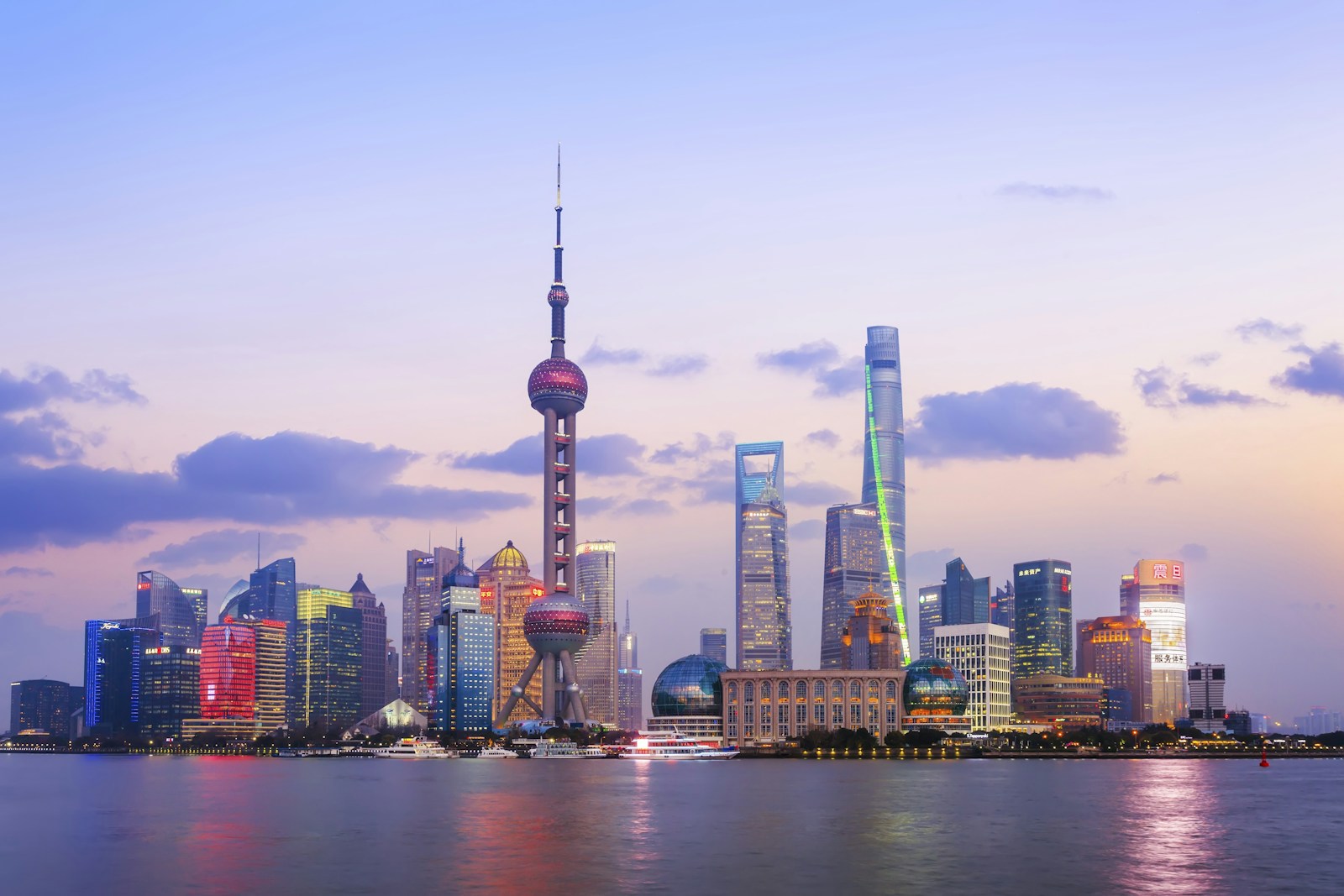 Shanghai skyline and the Huangpu River at dusk